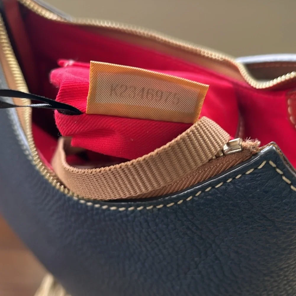 Dooney & Bourke Small leather Hobo bag in Navy Blue.